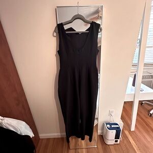 Gorgeous black jumpsuit, ties at the neck, low back, great for cocktail parties!